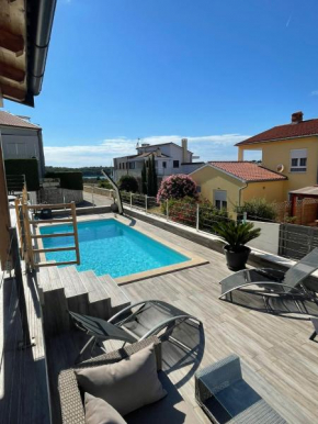 Two-bedroom apartment with own private pool near the beach
